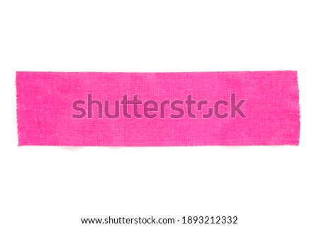 Piece of pink fluorescent tape isolated on white background. Bright neon pink duct tape.