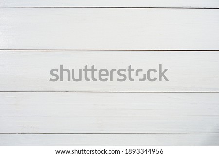 Light white wood wall texture background with copy space for your designs or add text to make work look better. High resolution wooden backdrop for website or wallpaper. material use as natural