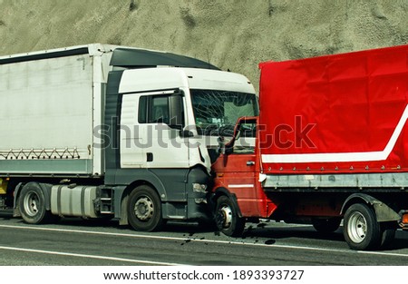 Road accident between two trucks. Frontal collision. Royalty-Free Stock Photo #1893393727