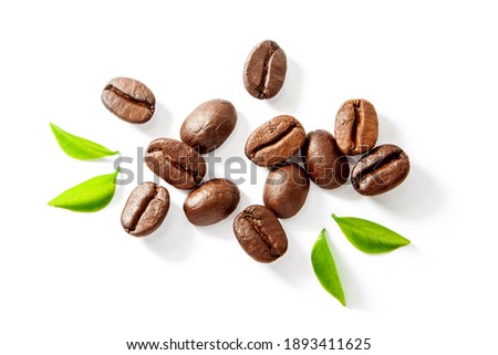 Coffee beans with green leaves isolated on white background , top view , flat lay. Royalty-Free Stock Photo #1893411625