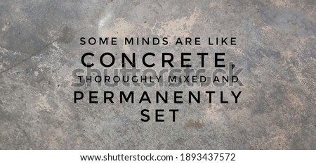 Motivational quote SOME MINDS ARE LIKE CONCRETE, THOROUGHLY MIXED AND PERMANENTLY SET written on concrete floor background.