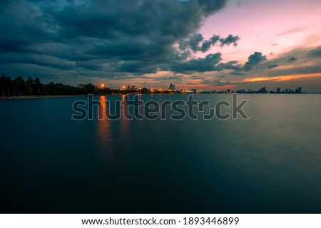 Nature blurred abstract background Of the colorful morning sun, a large lake, can see the scenery all around, cool atmosphere from the wind blowing all the time