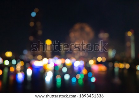 Soft focus and Bokeh blurred background of colorful lighting and fireworks  to celerbrate on night at the city.