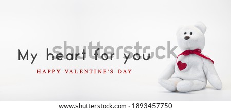 Toy polar bear. My heart for you. Happy Valentine's Day. On white background.