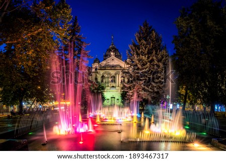 Picture of the State theatre of Kosice, Slovakia situated next to colourful singing fountain. Second largest theatre in Slovakia.  