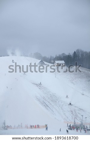 Winter. Sports winter season. Cesis. Latvia. Europe. Picture of of ski hill. Just another day skiing in the mountain. 