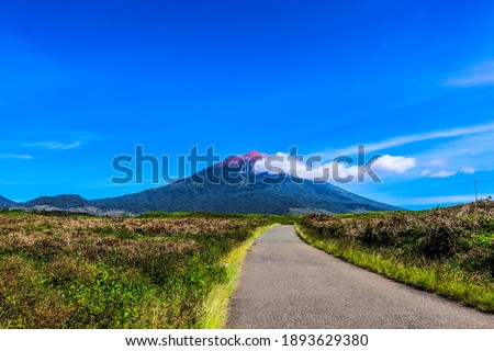 Mount Kerinci is the highest mountain in Sumatra and the highest volcano in Indonesia with an altitude of 3805 masl in the Kerinci Seblat National Park area. Kayu Aro, Kerinci, Jambi, Indonesia, Asia. Royalty-Free Stock Photo #1893629380