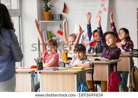Little children during lesson at language school Royalty-Free Stock Photo #1893649654