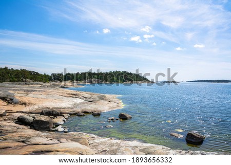 The rocky view of Porkkalanniemi, rocks, stones and Gulf of Finland, Kirkkonummi, Finland Royalty-Free Stock Photo #1893656332