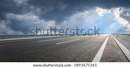 Empty asphalt road and blue sky with white clouds.Road background.