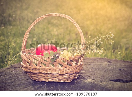 Vintage photo of spring basket with heart shape, detail