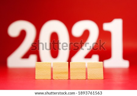 Template 4 word wooden block for word writing and blur 2021 on red background - red new year celebrate   advertising concept - creative design resource 