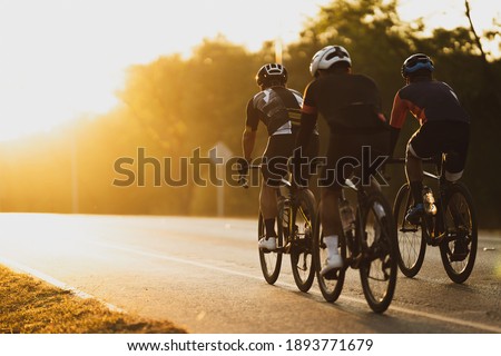 Cycling group training in the morning Royalty-Free Stock Photo #1893771679