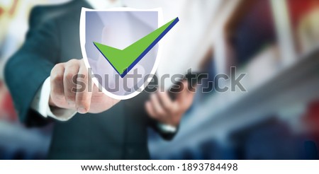 man holding phone and touching security shield in screen