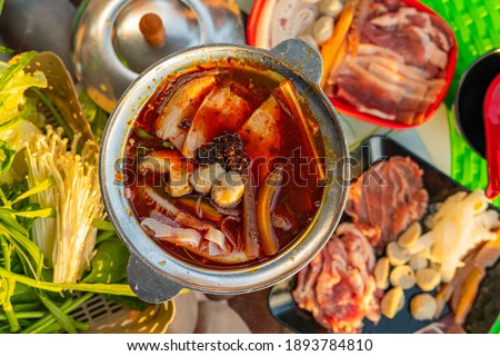 
Mala hot pot, spicy taste With side dishes ready to boil in restaurants selling grilled shabu in Thailand