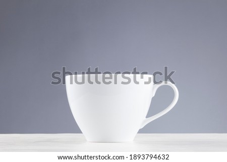 Closeup of a white coffee cup