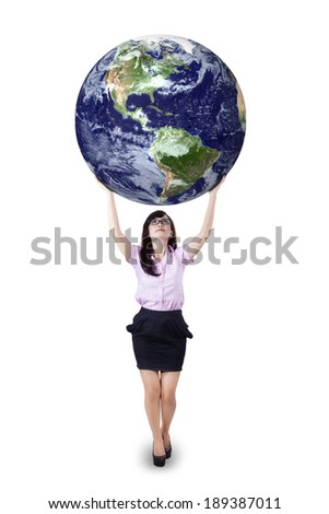 Businesswoman is holding world globe on white background. Earth image courtesy NASA