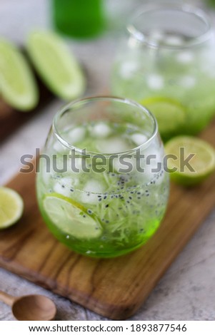 Es timun serut is a typical Indonesian drink. It is a drink made from cucumber vegetables and syrup. Selective focus. Closeup view. Blurred background
