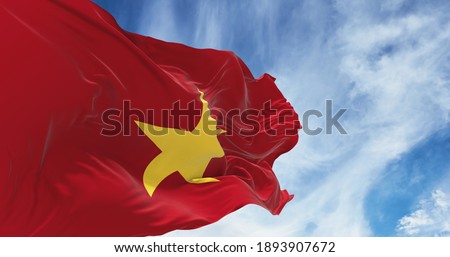 Large Vietnam flag waving in the wind