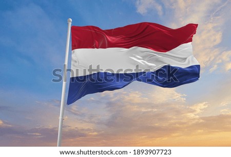 Large netherlands flag waving in the wind