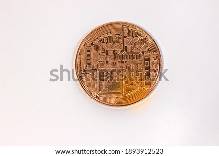 Physical bitcoin coin. Bitcoin on white background. Bitcoin cryptocurrency on white canvas.