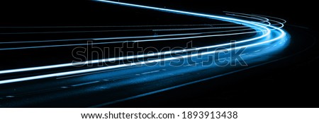 blue car lights at night. long exposure Royalty-Free Stock Photo #1893913438