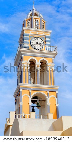 Bell tower of famous Catholic Cathedral Church of Saint John the Baptist in Fira on Santorini, Cyclades, Greece