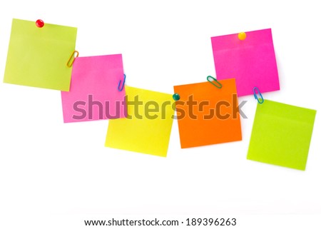 Color-message with the Vision paper clips and drawing pins on a white background