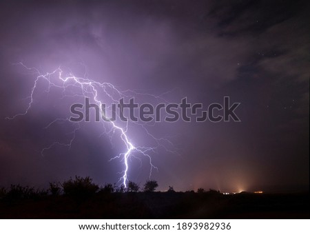 storm lightning over fields of spain
