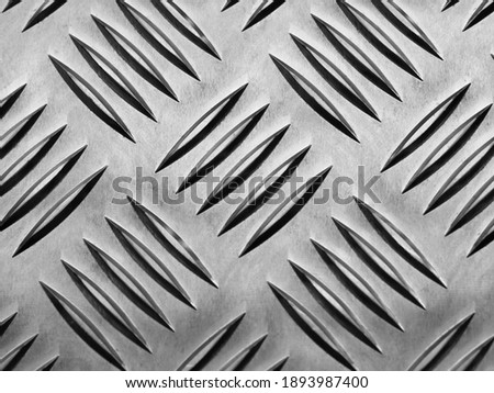 closeup of a metallic tread sheet