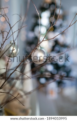 Christmas balls hanging on the wall background. High quality photo