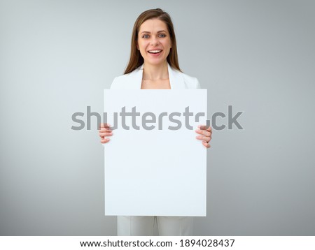 Buisness woman holding white empty banner. Isolated on white back female portrait.