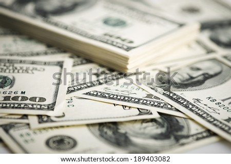 Stack of one hundred dollar bills close-up. (shallow DOF) 