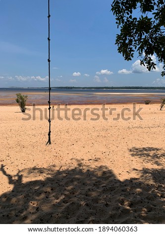 Photo of the horizon seen from the sands of the Tapajos river located in the city of Alter do Chão, Brazil.