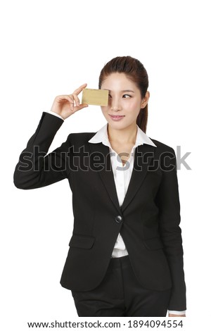A young Business woman holding credit card high quality photo