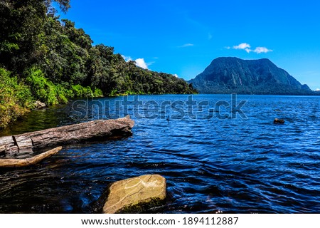 Gunung Tujuh lake is a caldera lake formed by volcanic activity in the past. This lake is the highest lake in Southeast Asia which is located at an altitude of 1996 masl and is in the TNKS area. Royalty-Free Stock Photo #1894112887