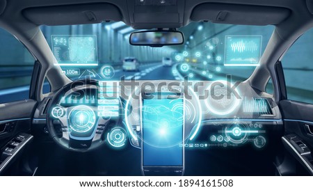 empty cockpit of vehicle, HUD(Head Up Display) and digital speedometer. autonomous car. driverless car. self-driving vehicle. Royalty-Free Stock Photo #1894161508