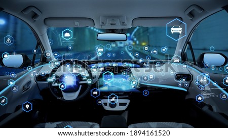 Interior of autonomous car. Driverless vehicle. Royalty-Free Stock Photo #1894161520
