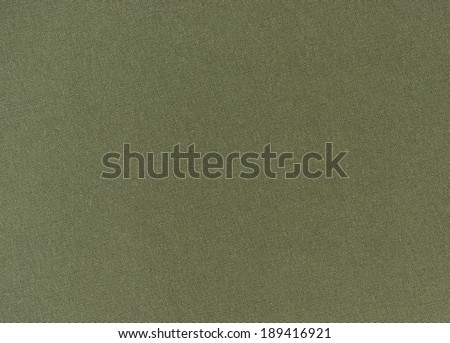 Fragment of dense synthetic fabric olive