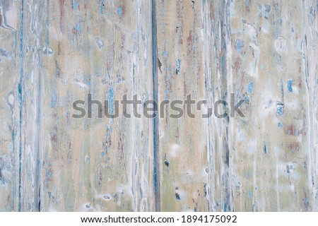 Old weathered blue and white grunge rustic wood panels. Wooden aged textures planks stock photo