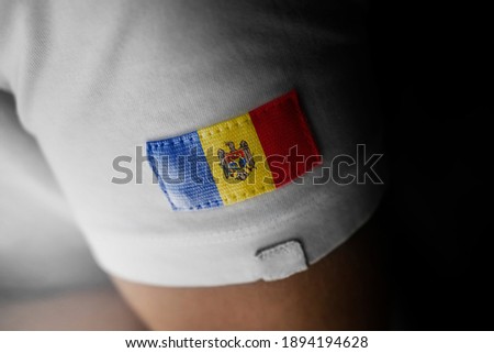 Patch of the national flag of the Moldavia on a white t-shirt