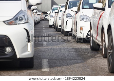 Urban city transportation. Several taxis vehicles in line. Cab stop