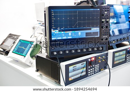 High-resolution digital oscilloscope and pulse generator electronic devices Royalty-Free Stock Photo #1894254694