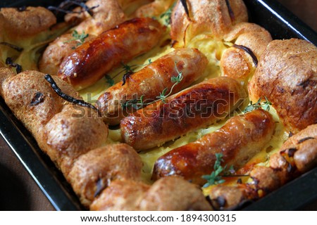 Toad In The Hole Traditional British Food Royalty-Free Stock Photo #1894300315