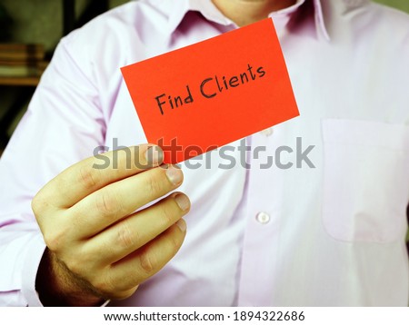 Business concept meaning Find Clients with inscription on the sheet.
