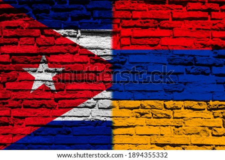Flag of Cuba and Armenia on brick wall