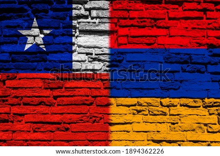 Flag of Chile and Armenia on brick wall