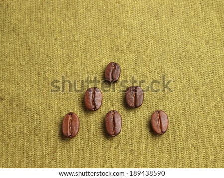 Roasted Coffee Beans on fabric textile