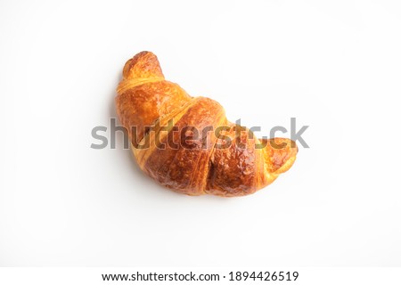 Fresh croissant on a white background Royalty-Free Stock Photo #1894426519
