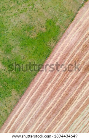 Aerial view of agricultural landscape in Hornillastra village within of Merindad de Sotoscueva area of Burgos province in Castilla y Leon Autonomous Community of Spain, Europe